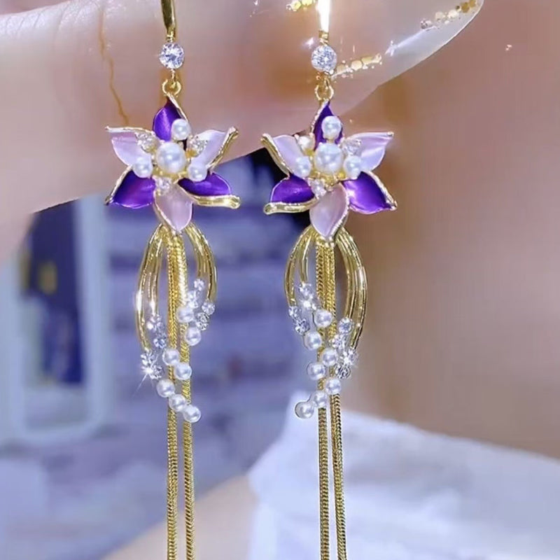 Elegante Ohrringe mit violetten Blütenquasten