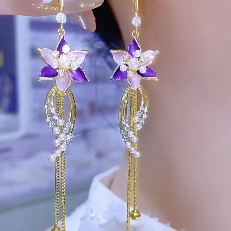 Elegante Ohrringe mit violetten Blütenquasten
