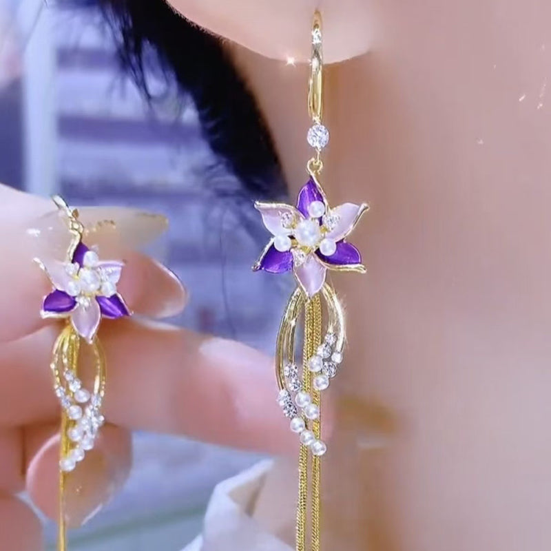 Elegante Ohrringe mit violetten Blütenquasten