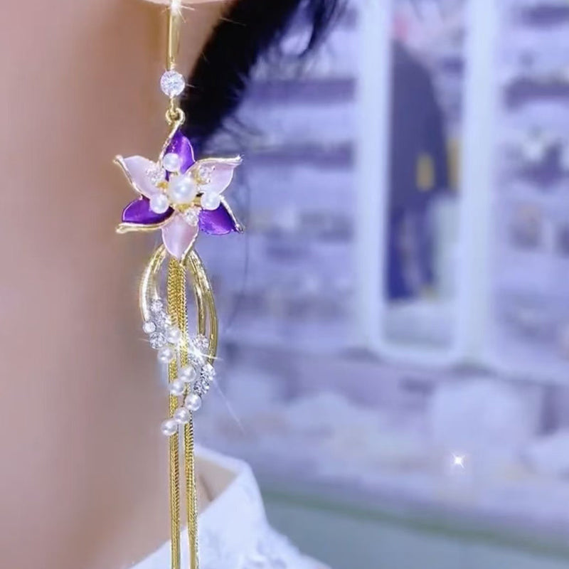Elegante Ohrringe mit violetten Blütenquasten