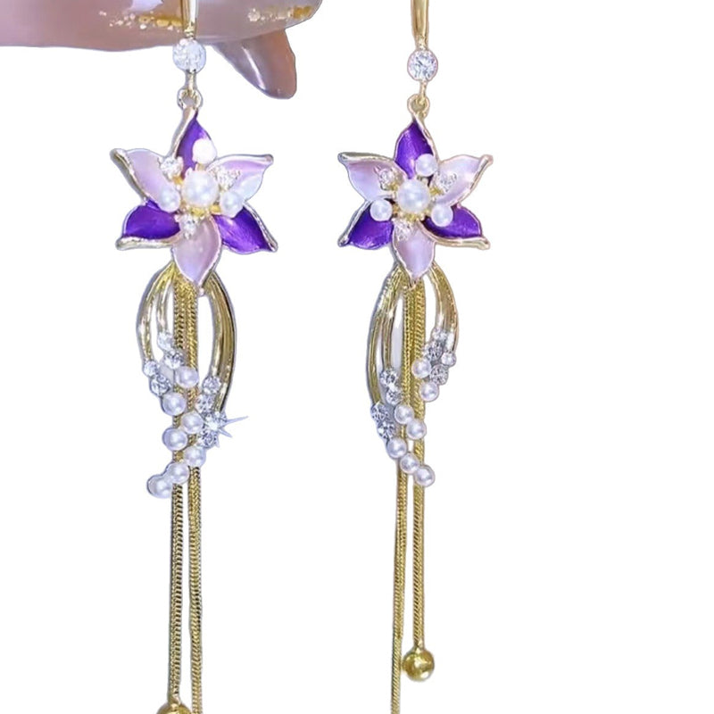 Elegante Ohrringe mit violetten Blütenquasten