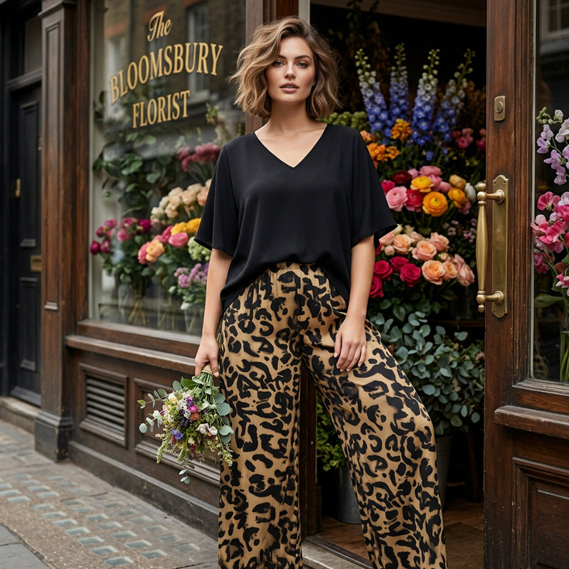 👚 50% RABATT! 🐆 Damen Set: V-Ausschnitt Top & Hose mit Leopardenmuster – Wild, bequem & perfekt für einen trendigen Look ✨